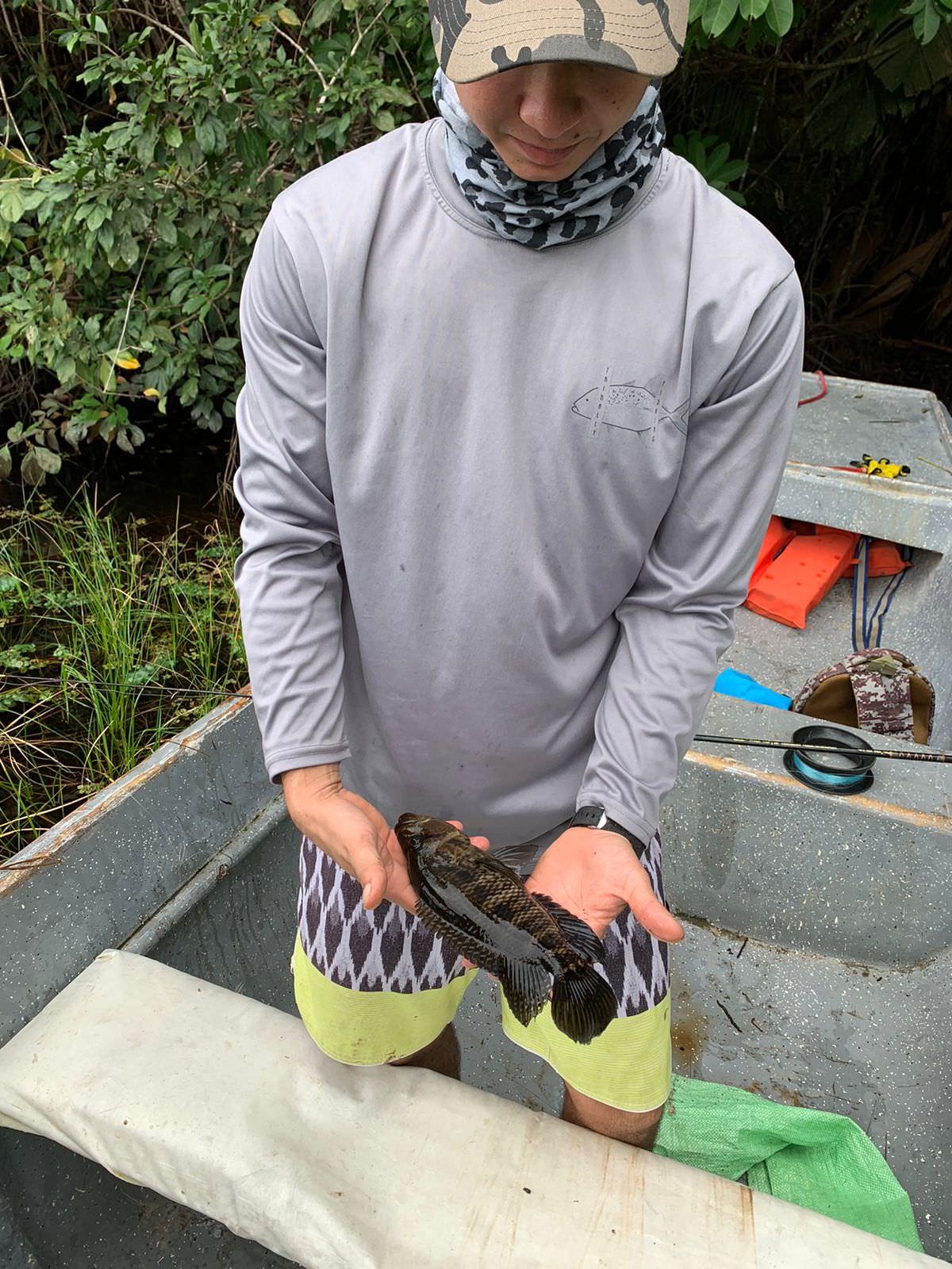 Fishing guide holding a great catch