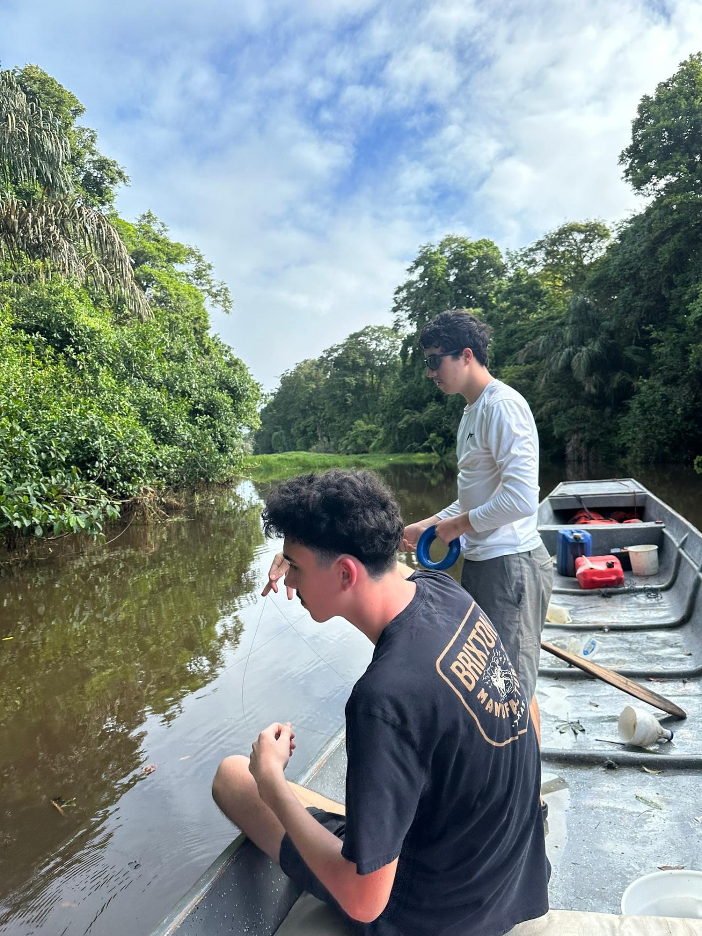 Boys fishing in Tortuguero